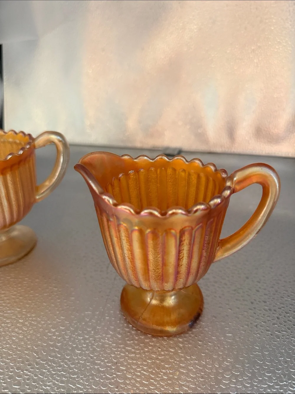 Vintage “Striped Rays” Carnival Glass sugar and creamer set.
